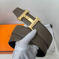 Hermes belt in dark brown textured leather with gold H buckle detail