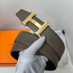 Hermes belt in dark brown textured leather with gold H buckle detail