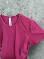 Pink ribbed T-shirt with short sleeves and crew neckline