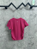 Pink ribbed crew-neck T-shirt with small chest logo