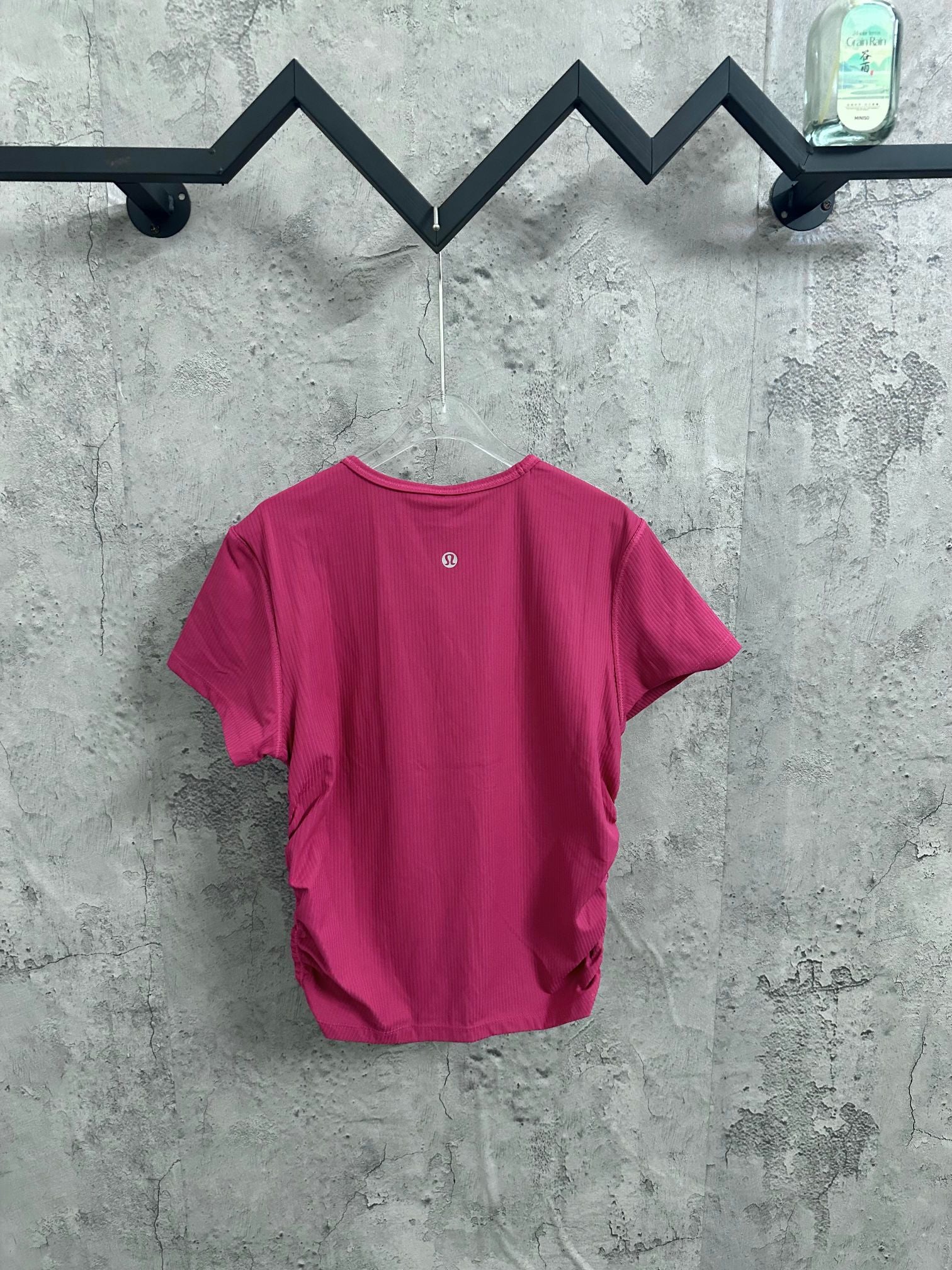 Pink ribbed crew-neck T-shirt with small chest logo