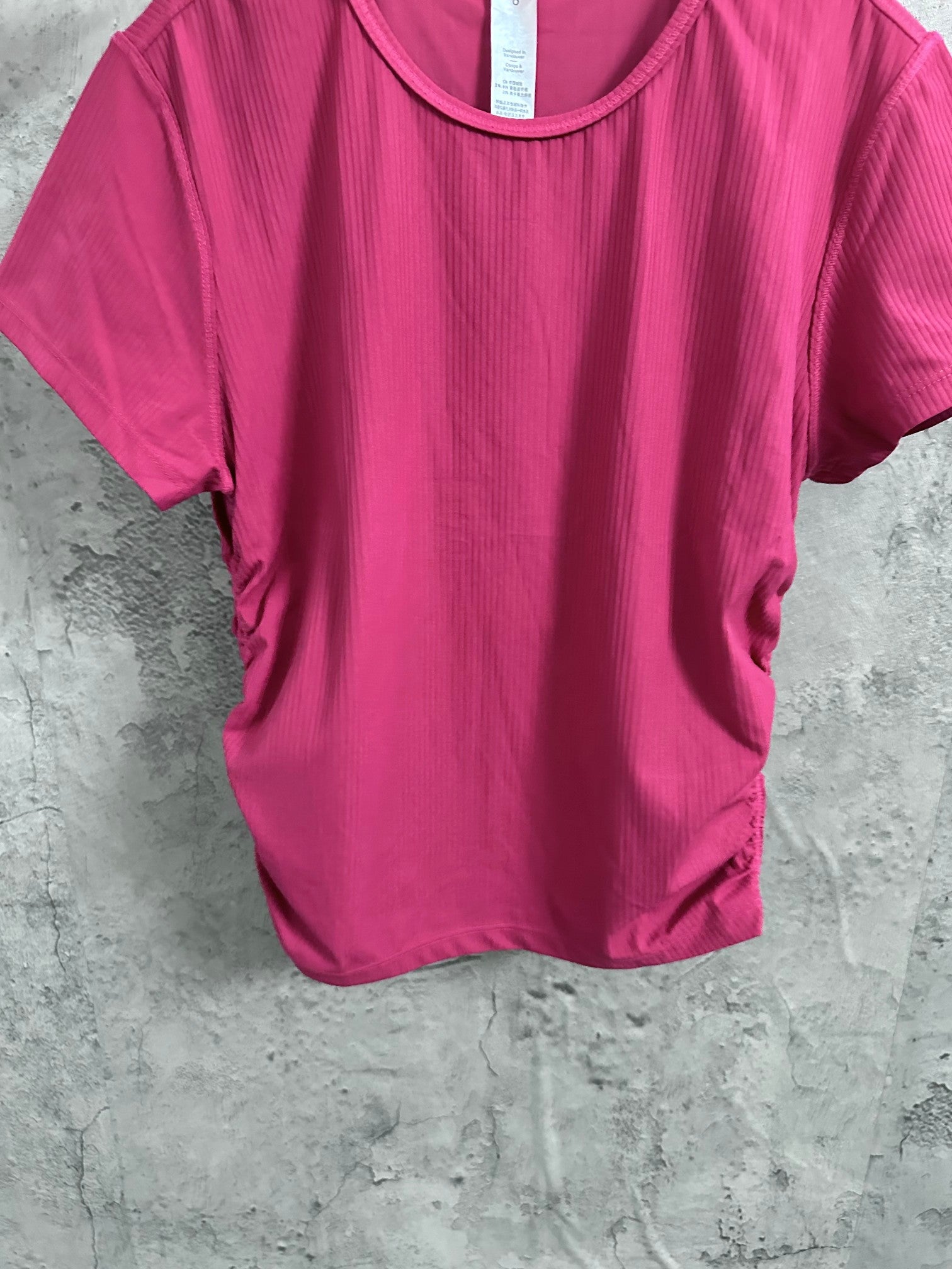 Pink ribbed T-shirt front view, crew neck and short sleeves
