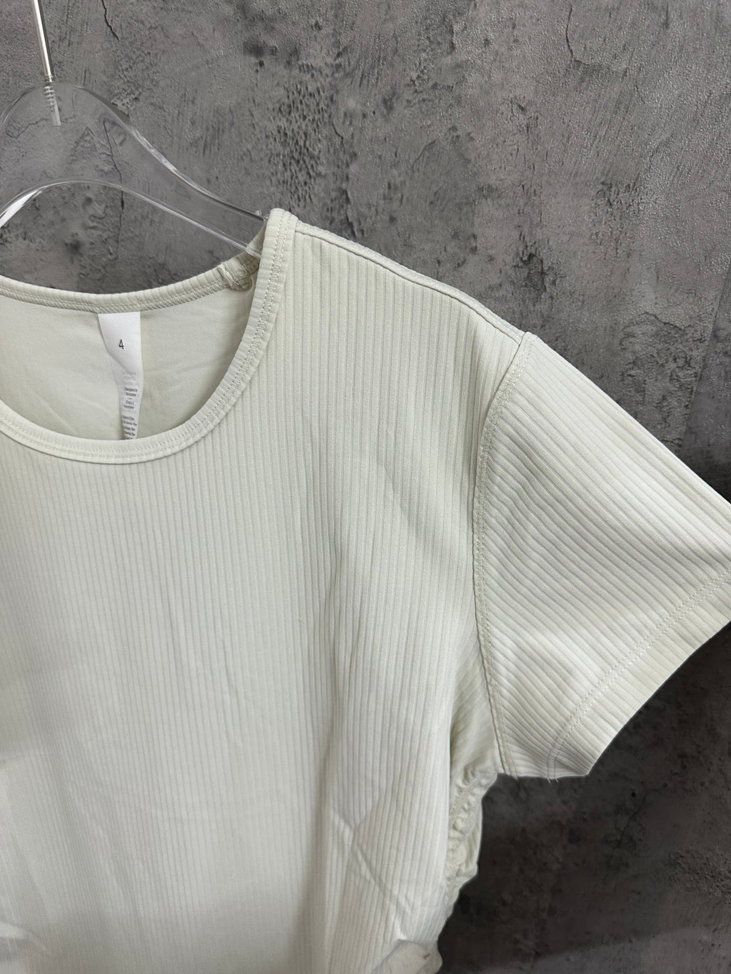 Cream ribbed short-sleeve T-shirt with side seam view