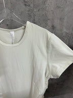 Cream ribbed short-sleeve T-shirt with side seam view