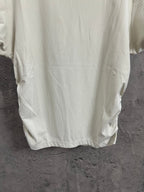 Cream ribbed T-shirt back hem and lower back detail