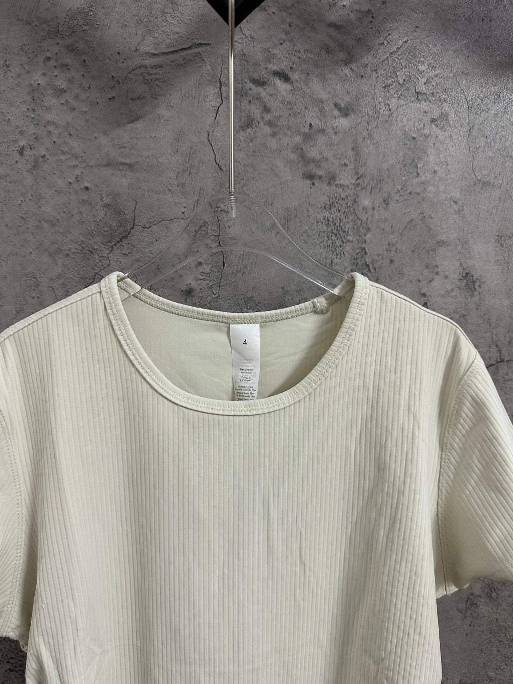 Cream ribbed crew-neck T-shirt neckline detail