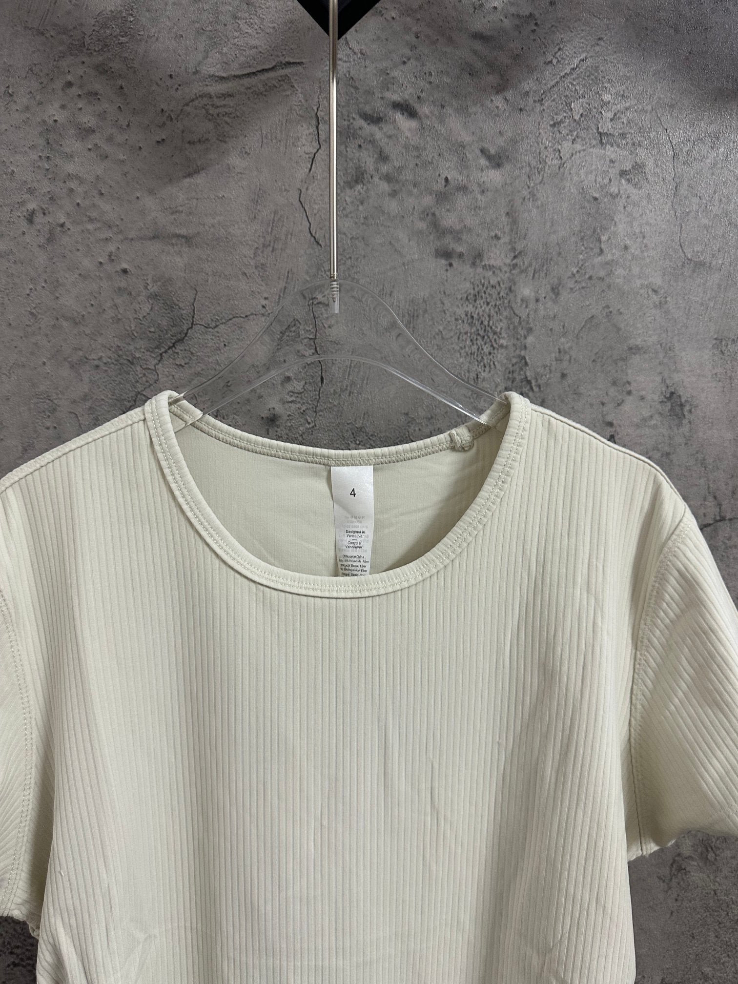 Cream ribbed crew-neck T-shirt neckline detail