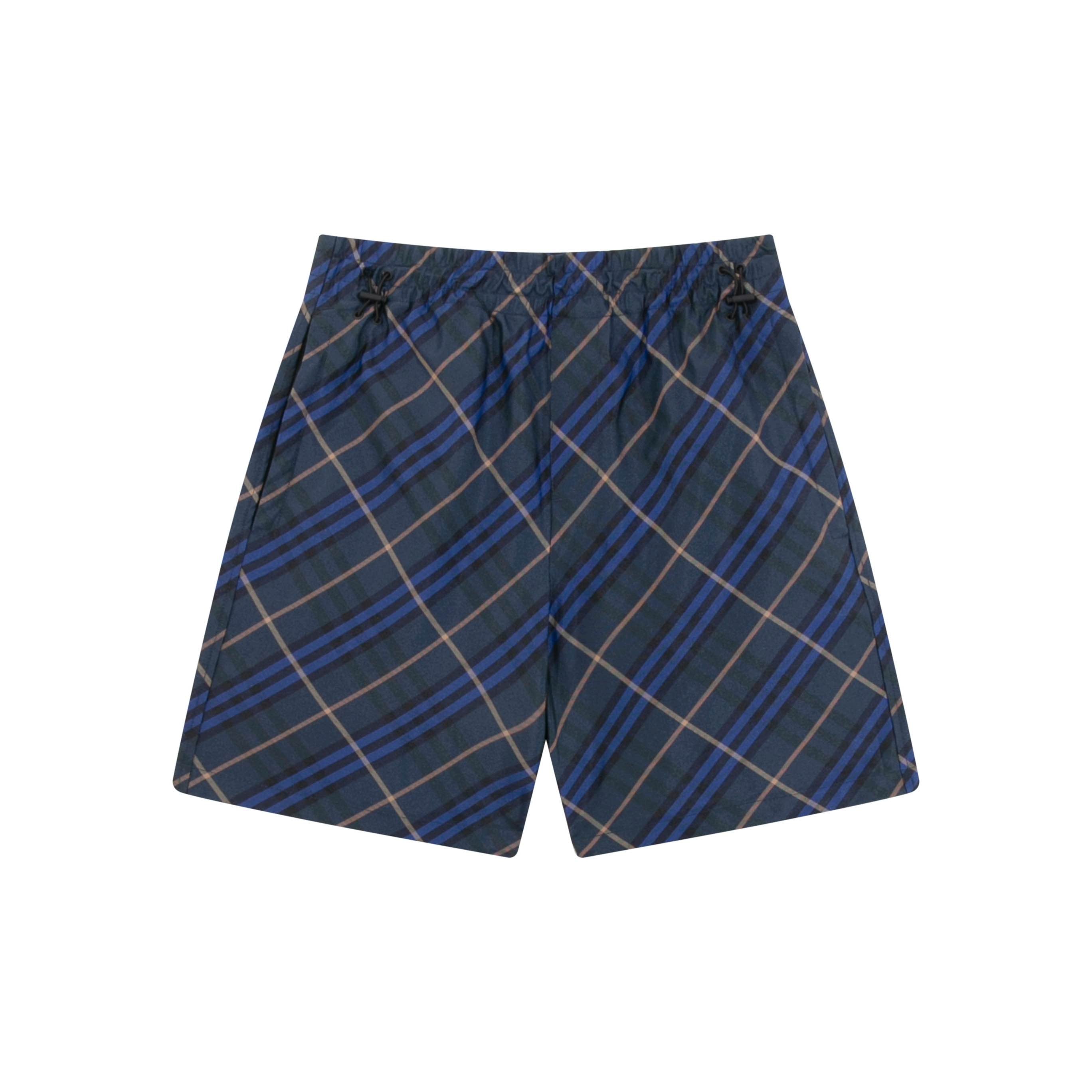 Navy plaid shorts with drawstring waist, side pockets, and relaxed fit
