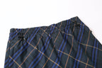 Plaid shorts waistband with elastic, drawstring ties, and gathered trim