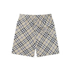 Burberry check plaid shorts, beige with black and blue; side pockets and button details