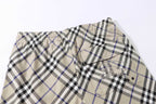 Burberry check plaid shorts, beige with black and blue; front view with drawstring