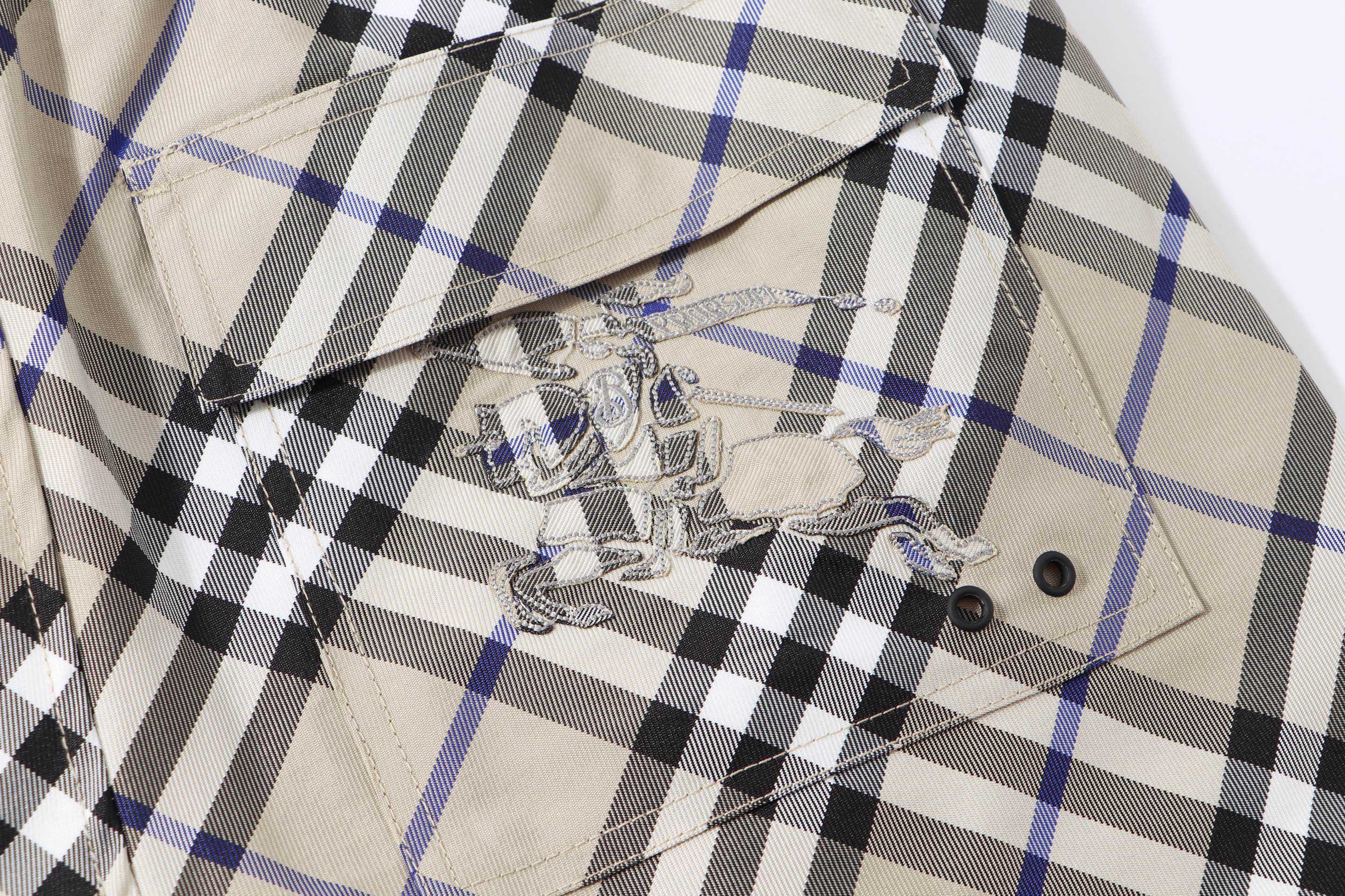 Burberry check plaid shorts front with embroidered horse emblem and button tab