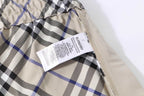 Burberry check plaid shorts with size and care labels inside the waistband