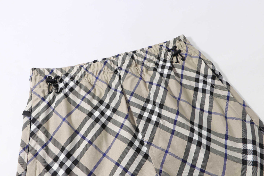 Burberry check plaid shorts waistband detail with black drawstring tips