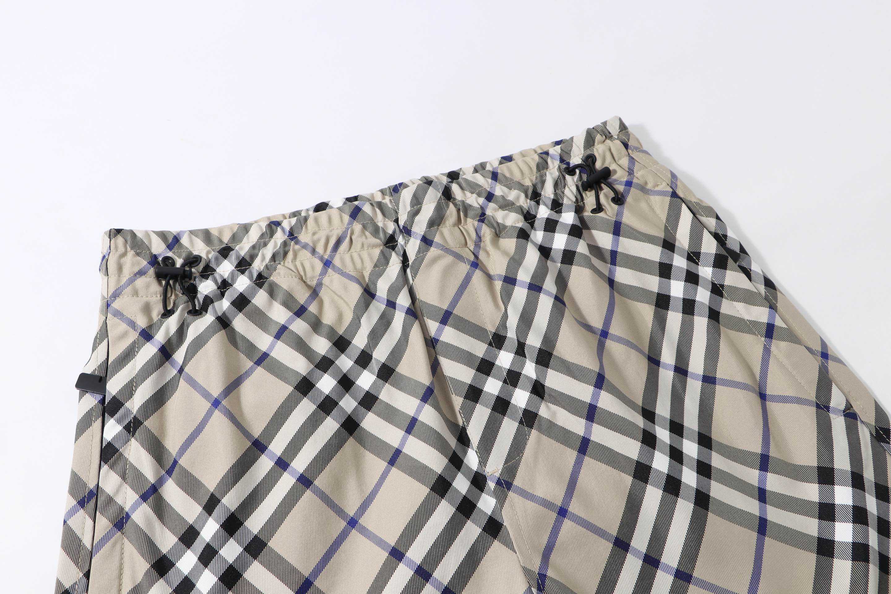 Burberry check plaid shorts waistband detail with black drawstring tips