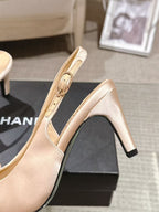 Women's beige pointed-toe slingback heel with black sole trim and block heel