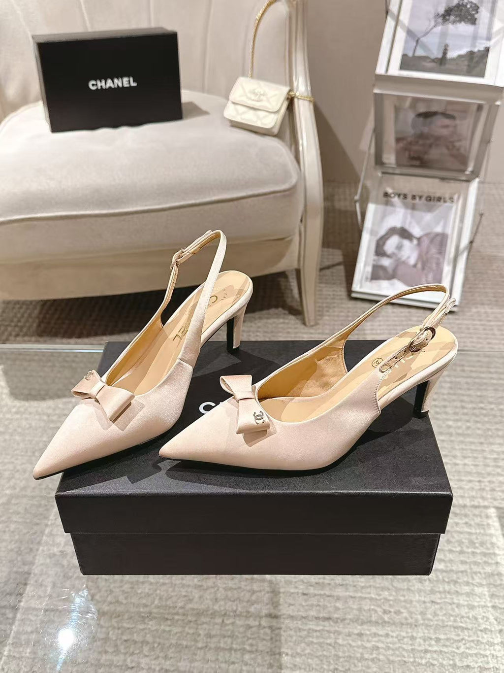 Women's beige pointed-toe slingback heels with bow at vamp and block heel