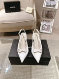 Chanel ladies white pointed-toe slingback pumps with bow and low heel