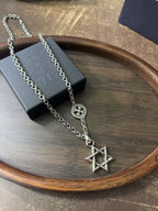 Silver-tone chain necklace with circular crest and star of David pendant