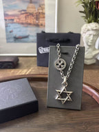 Silver-tone chain necklace with circular medallion and star pendant