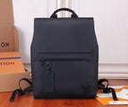 Black leather backpack with top handle and flap closure