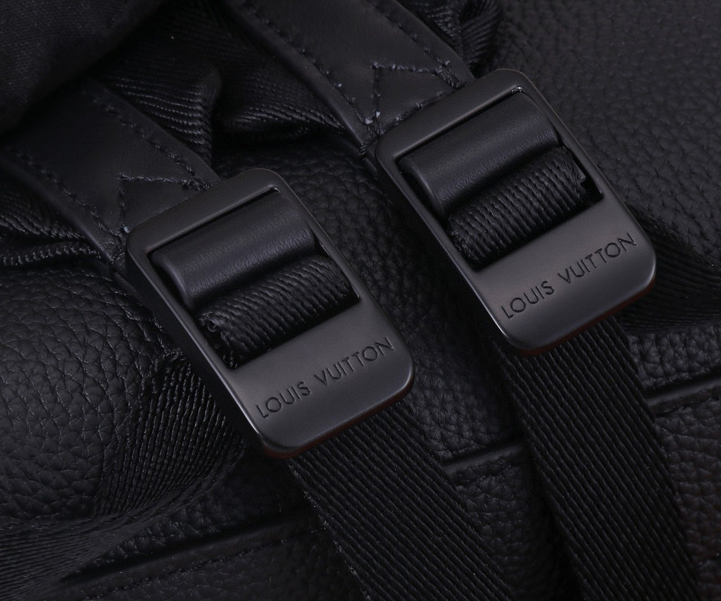 Black leather strap ends with engraved buckle hardware