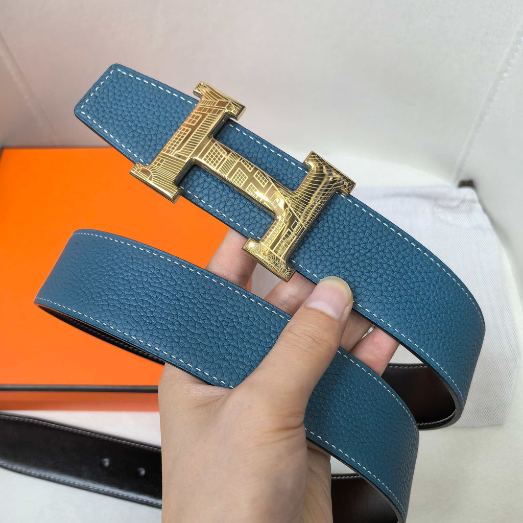 Hermes belt in textured blue leather with gold-tone H buckle and wide strap