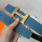 Hermes blue leather belt with gold-tone H buckle and adjustment holes