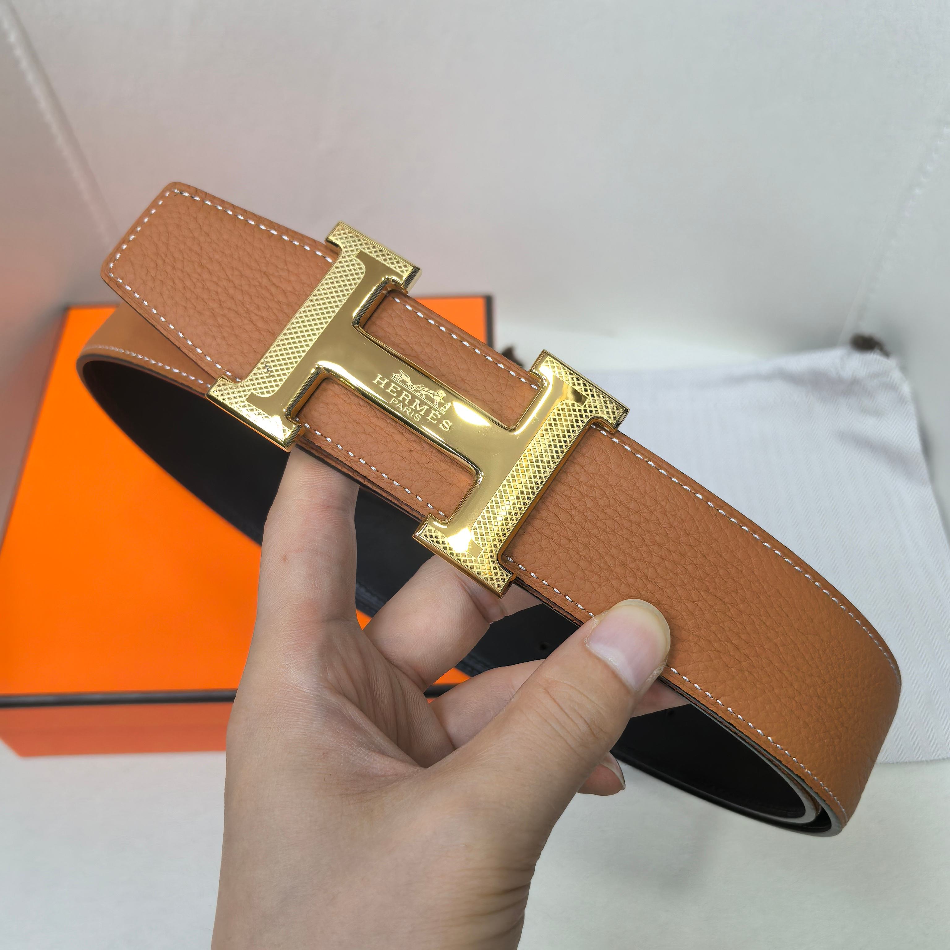 Hermes belt tan leather with gold-tone buckle, open end and smooth lining.