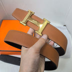 Hermes belt tan leather with gold-tone buckle and contrast stitching on strap.