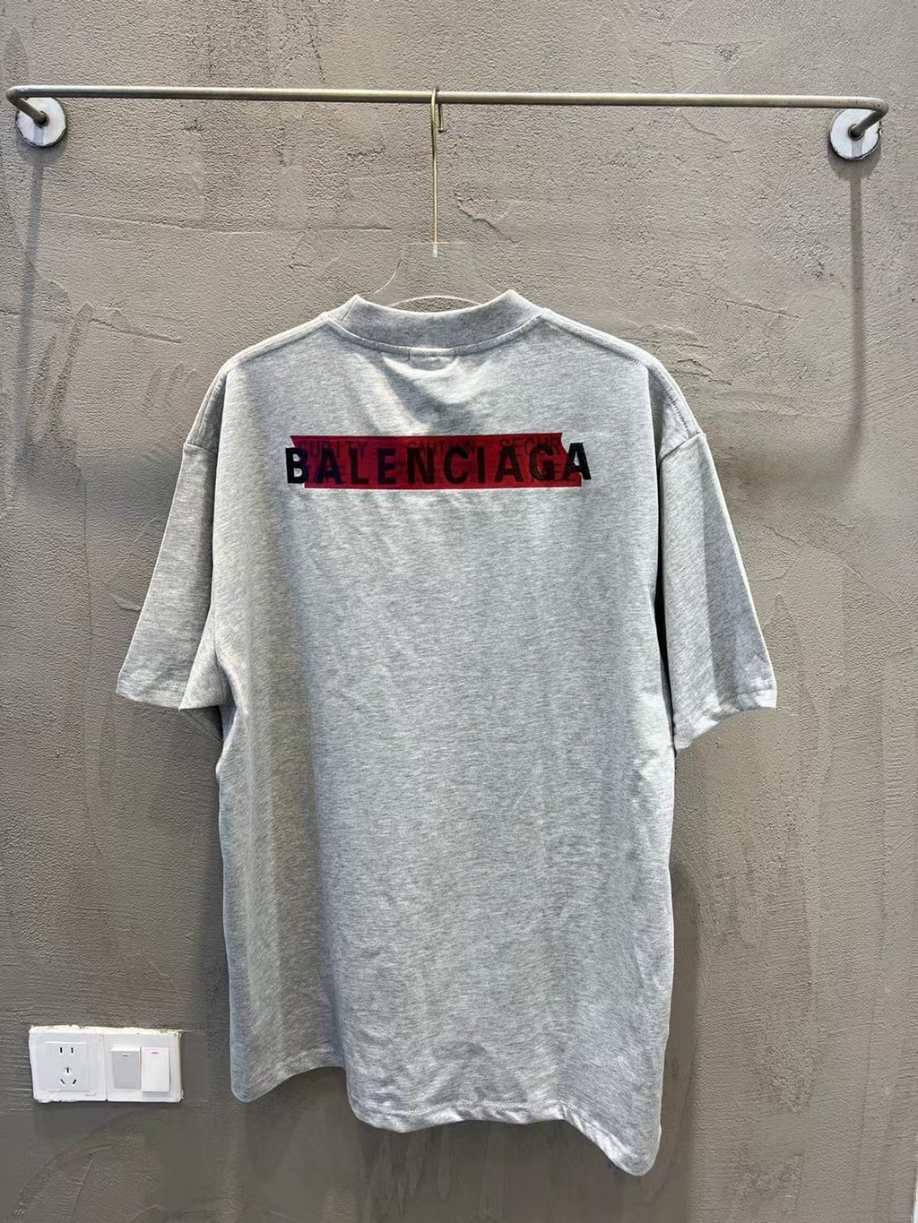 Balenciaga T-shirt, light gray crewneck with large black-and-red BALENCIAGA print