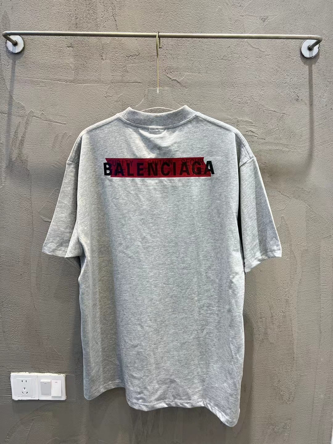 Balenciaga T-shirt, light gray crewneck with large black-and-red BALENCIAGA print