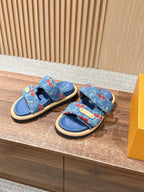 Louis Vuitton denim sandals, blue with red cherry print, shown pair side view