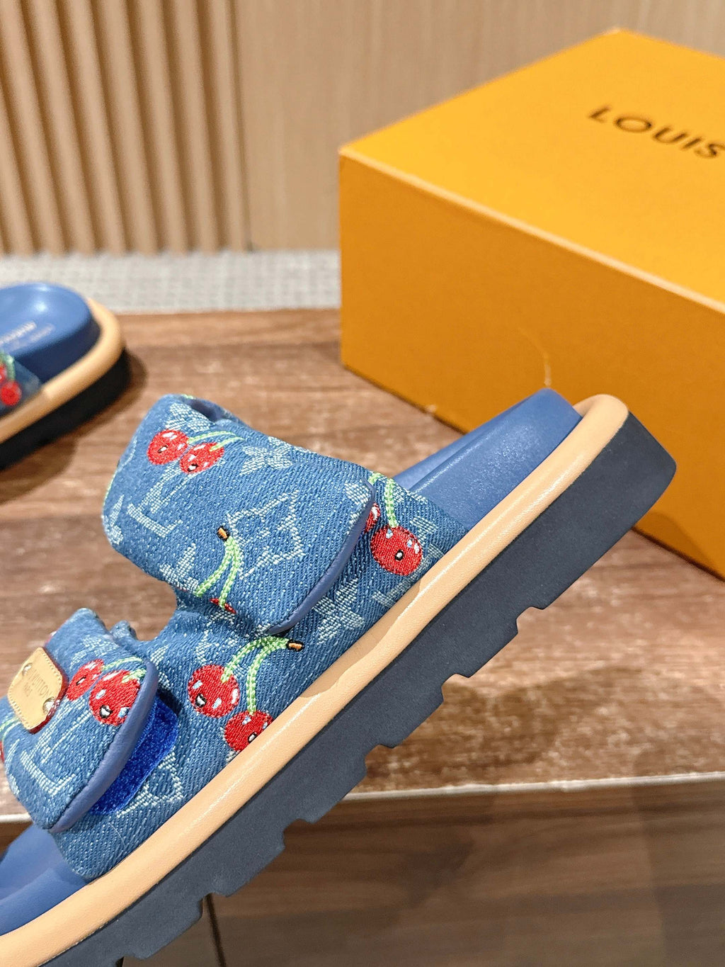 Louis Vuitton denim slide sandals, blue with red cherry print and tan edging