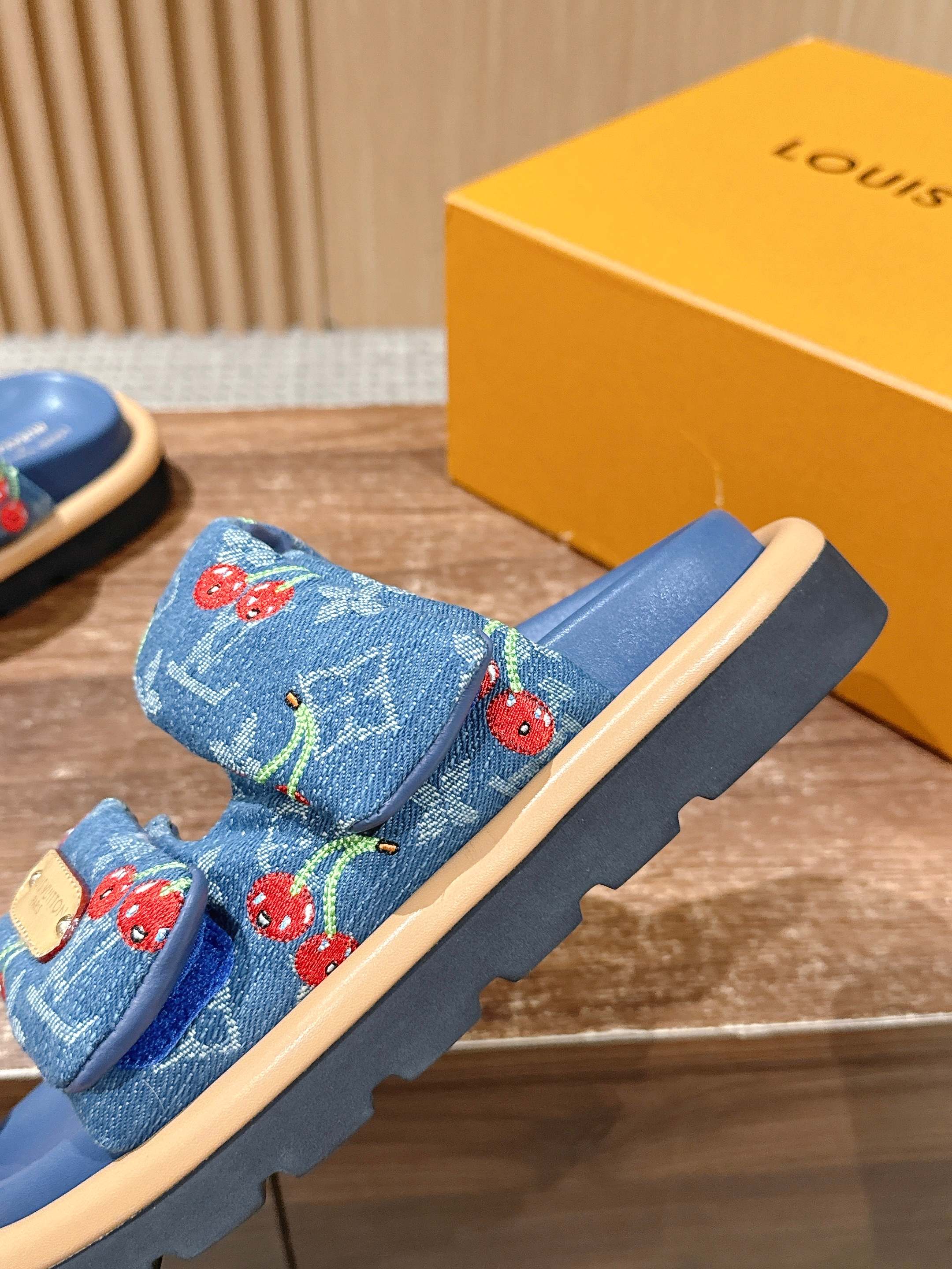 Louis Vuitton denim slide sandals, blue with red cherry print and tan edging