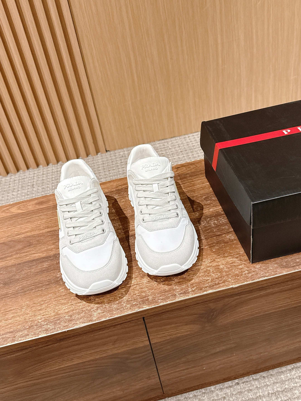 Prada unisex white sneakers, lace-up front and textured rubber sole