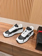 Black and white unisex sneakers, lace-up design with white midsoles