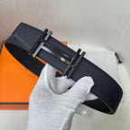Navy leather belt with silver-tone buckle and adjustable end