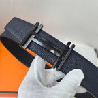 Navy leather belt with silver-tone buckle detail