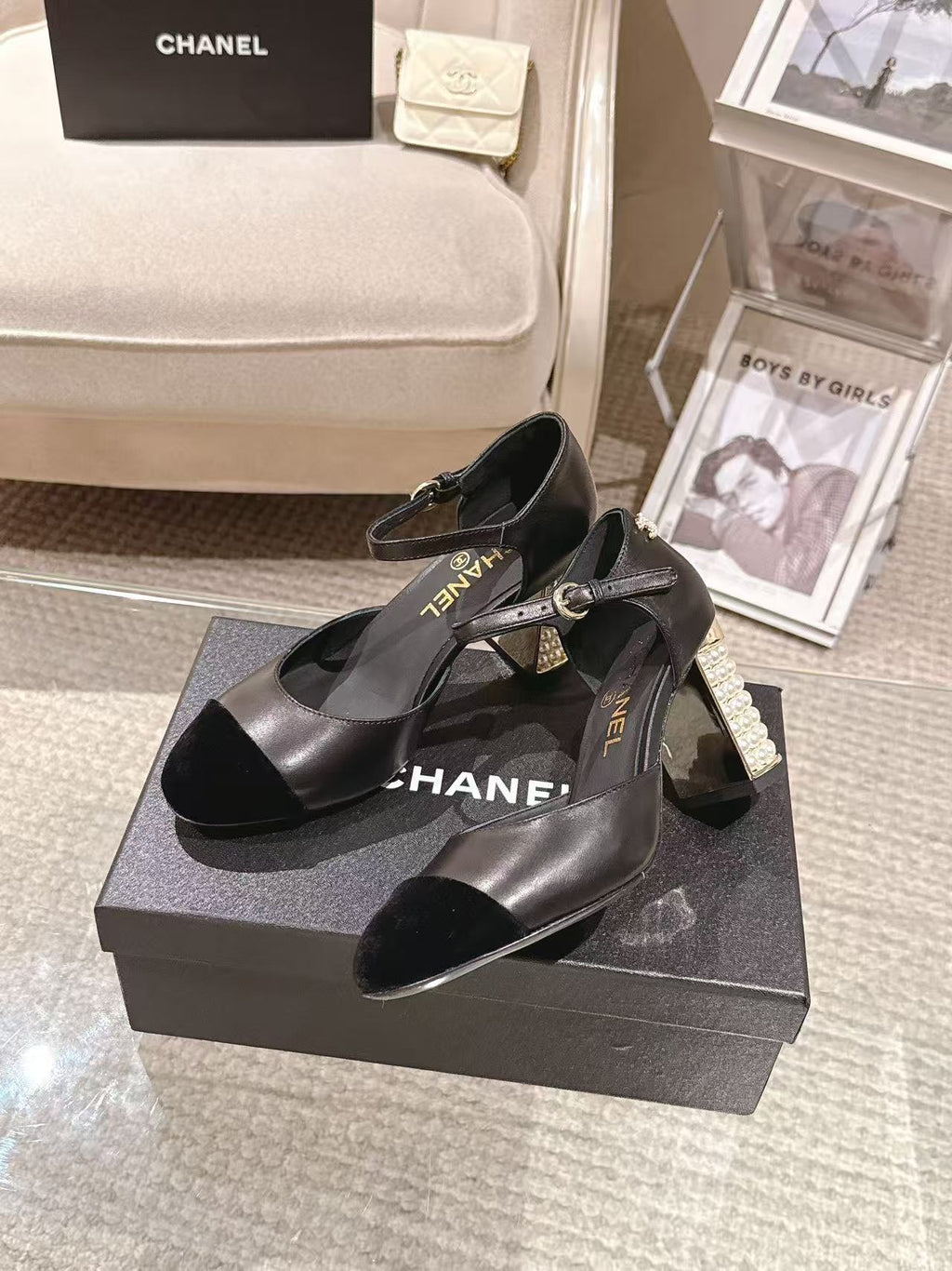 Women's black heeled sandals on box, pearl-embellished block heels and ankle strap