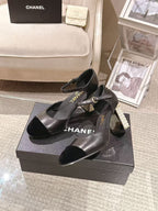 Women's black heeled sandals on box, pearl-embellished block heels and ankle strap