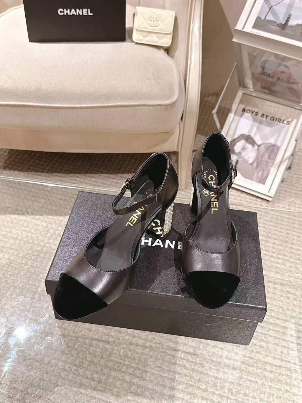 Women's black heeled sandals on box, ankle strap and gold-pearl heel accents