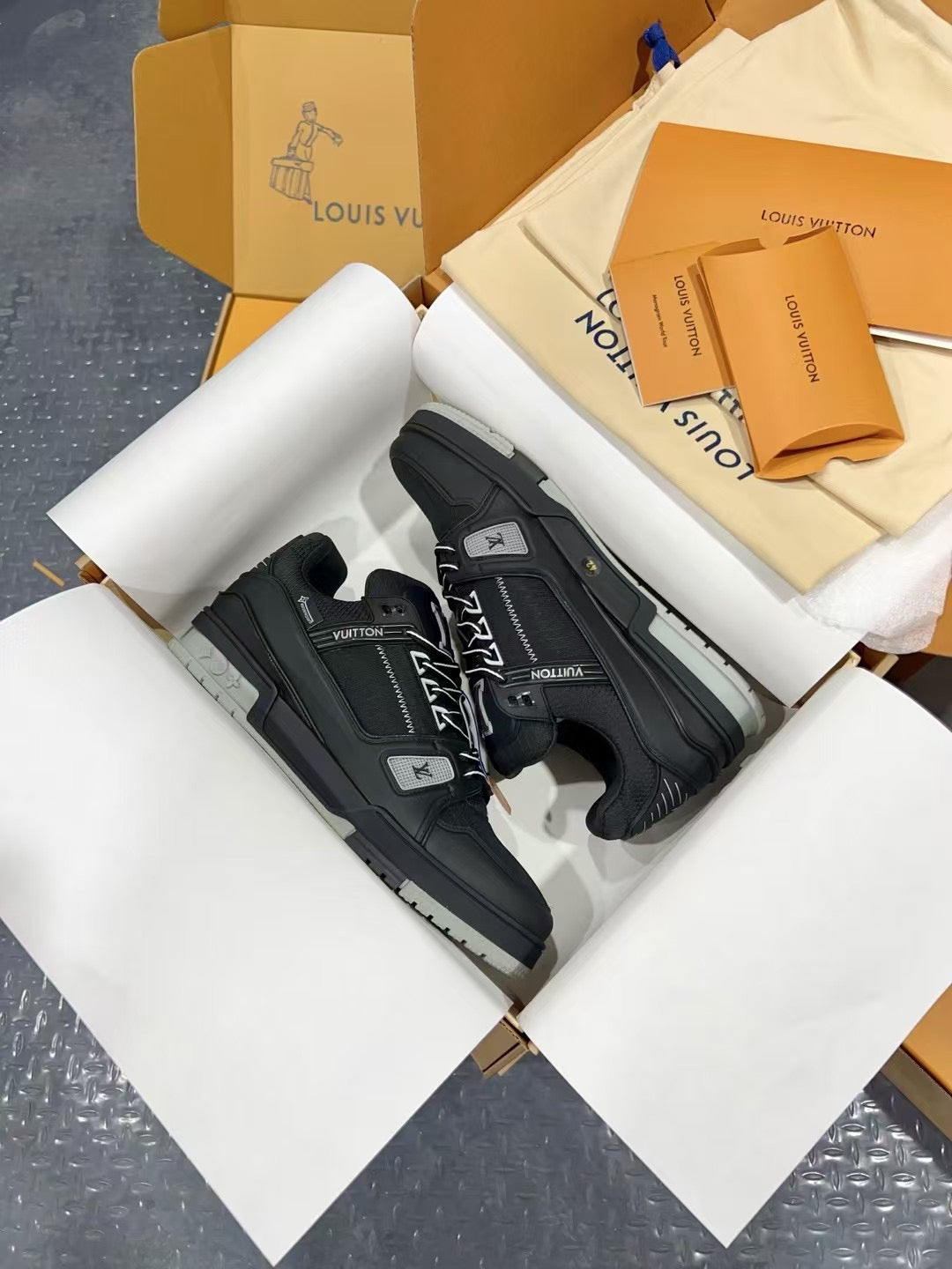 Black Louis Vuitton trainer shoes with chunky sole, in-store packaging
