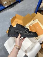 Louis Vuitton black Monogram lace-up sneakers with blue stripe detail