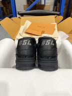 Louis Vuitton black sneakers with #54 emblem on heel