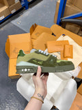 Green and olive Louis Vuitton trainer sneakers with white laces and side LV logo