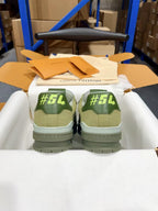 Back view of green and olive Louis Vuitton trainer sneakers with #54 on heels