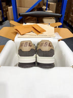 Louis Vuitton trainer sneakers with dark gray heels and white midsoles, back view