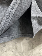Heather gray knit top inside hem with printed label band