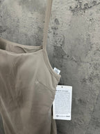 Ralph Lauren sleeveless beige dress close-up, scoop neckline and side seam detail